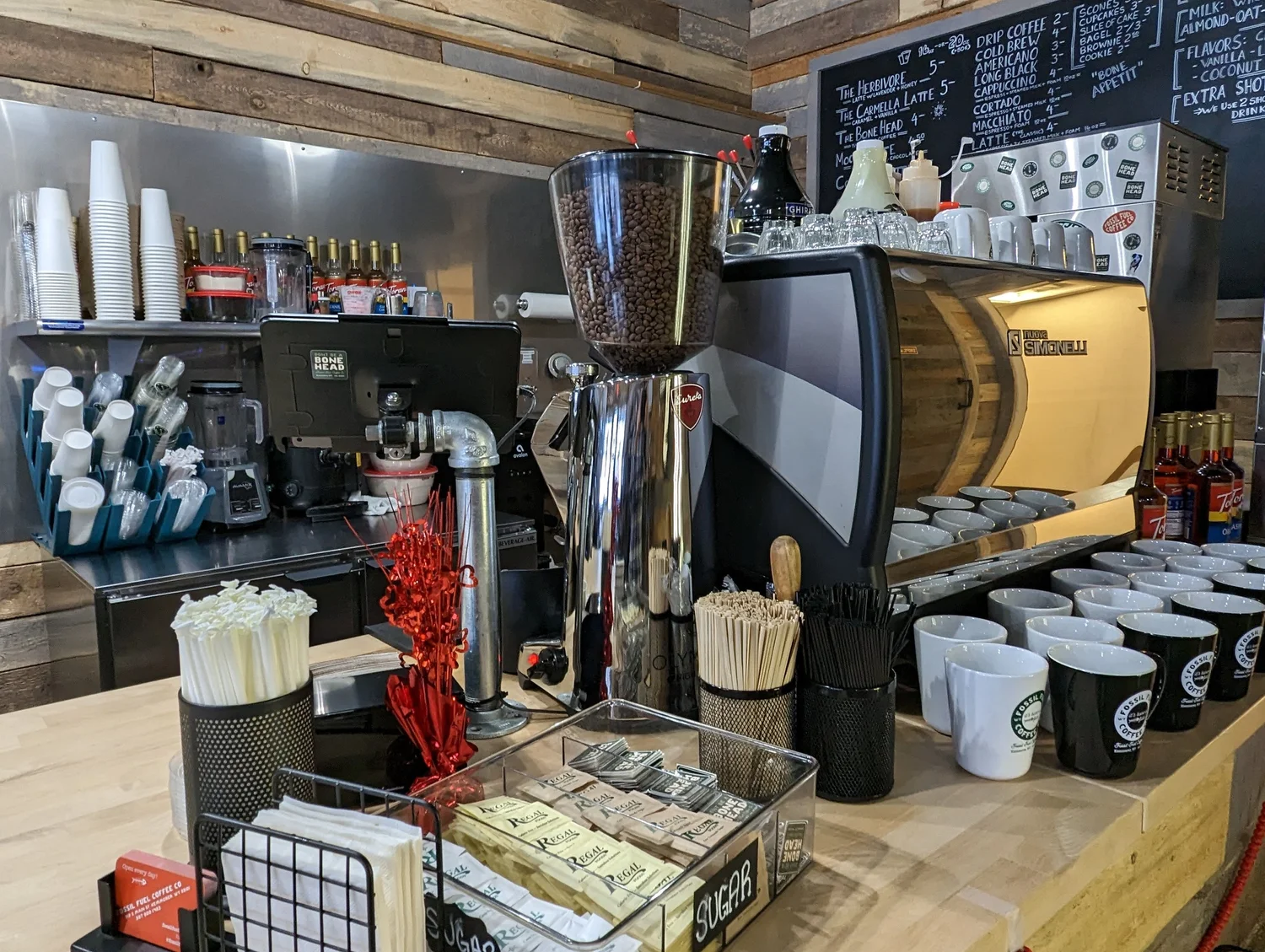 Fossil Fuel ceramic mugs on the bar