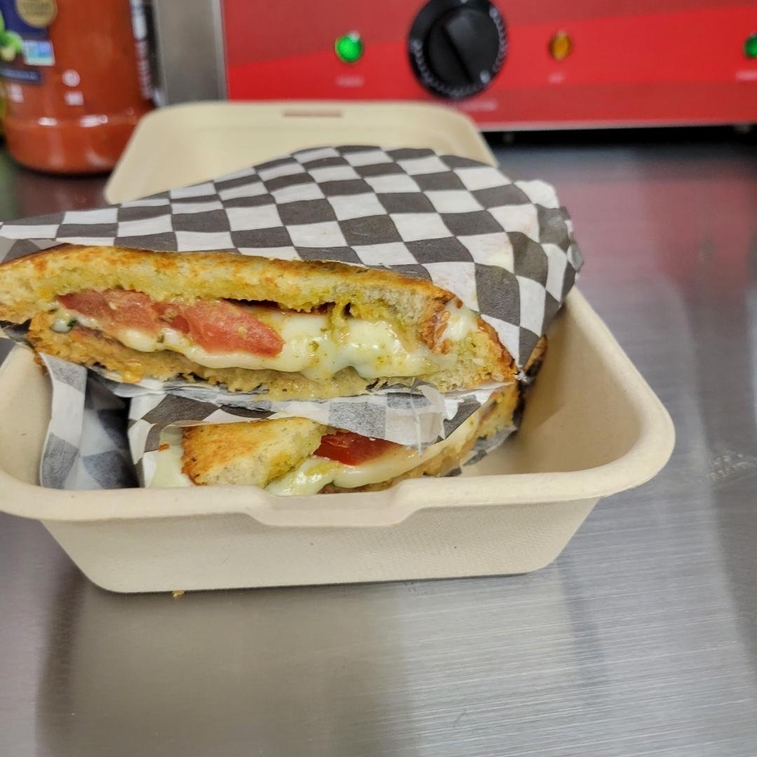 The Yellowstone panini — tomato, pesto, and mozzarella