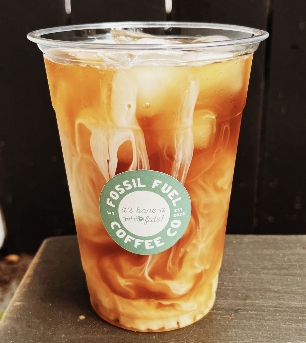 A Fossil Fuel latte in a branded cup